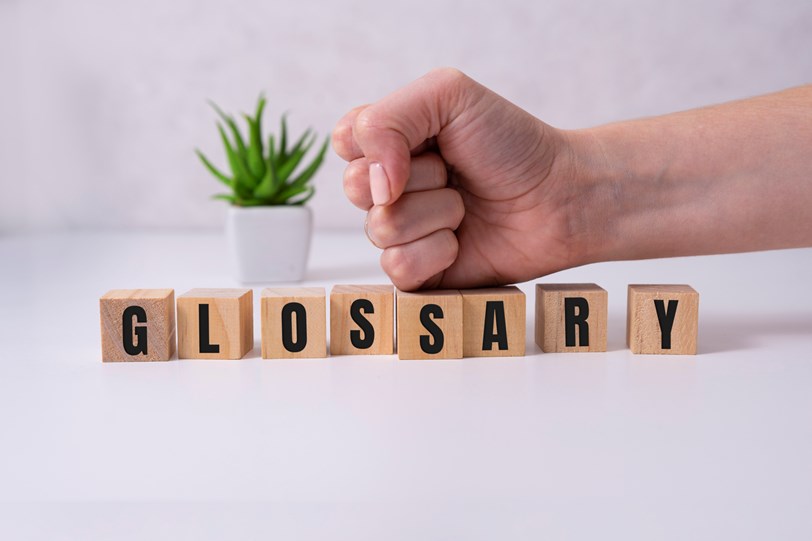 A picture of a number of cubes spelling the word glossary
